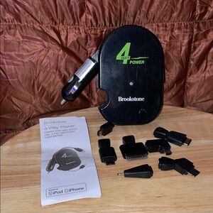 Brookstone Black & Green Multi-Adapter Charger with carrying bag.